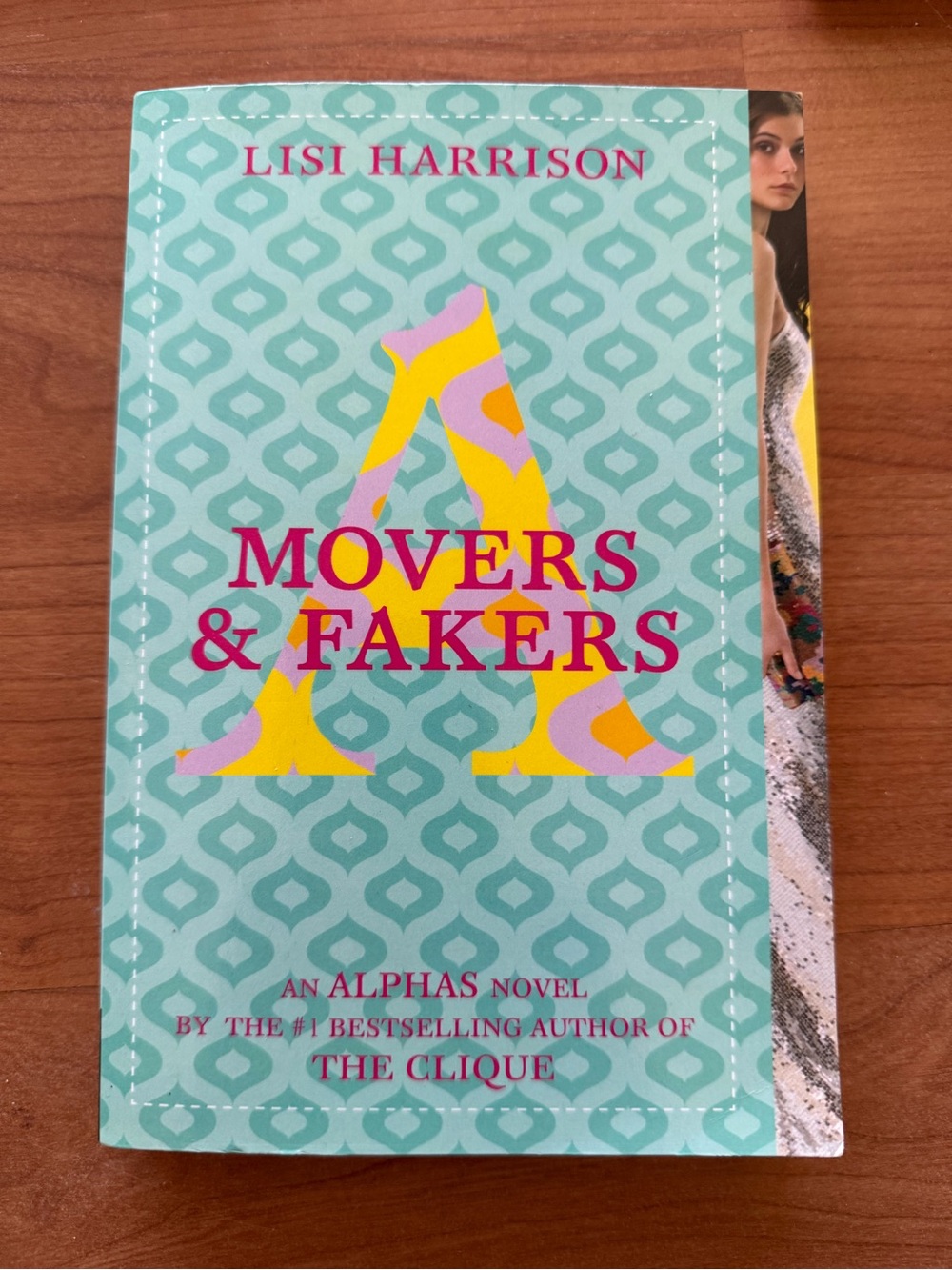 Movers & Fakers by — Teal Cover Paperback